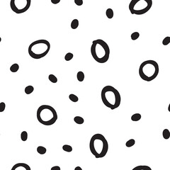 Doodle dots seamless pattern. Hand drawn circles background. Monochrome texture.