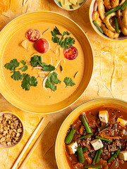 Asian food on painted background, Close up photo of dishes for restaurants with Japanese Chinese and Thai food with native space 