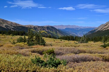 Scenic fall view from Guanella Pass, Colorado trailhead. A scenic byway with spectacular views, fall colors and blue sky over a mountainous valley. A Denver area hiking, fall color viewing destination