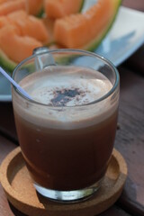 Close up hot chocolate in white ceramic cup