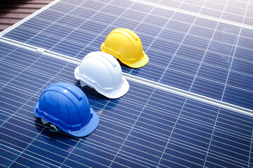 A safety helmet to prevent head bumps during work, a blue, white, yellow mechanic is placed on the...