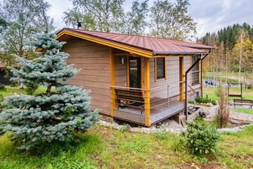 House in the nature. Small wooden house in the forest. Cottage t