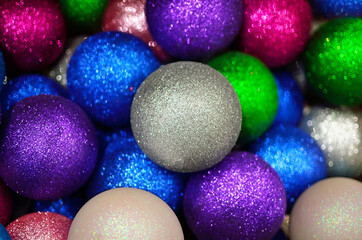 Texture from colorful, shiny Christmas balls. New Year decoration.