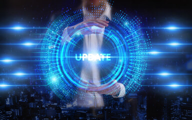 Business, Technology, Internet and network concept. Young businessman working on a virtual screen of the future and sees the inscription: Update