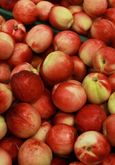 Fototapeta na wymiar many peaches in a market
