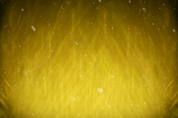 Snow falls on the background of an abstract, golden texture - Powered by Adobe