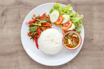 Thai Food Rice topped with stir-fried pork and basil