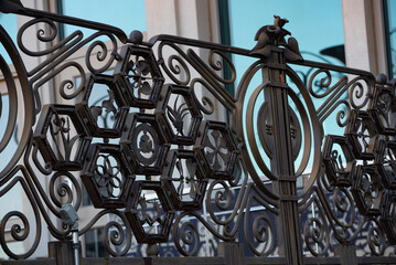 Forged iron fence around the building