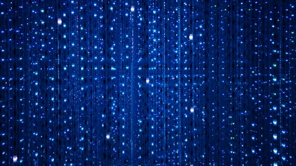 Blue stage background of LED flashing and flickering bulbs.