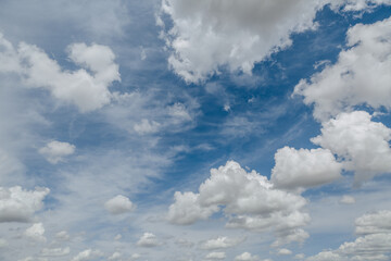 White, Fluffy Clouds In Blue Sky. Background From Clouds