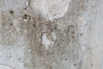 Old concrete wall with moss and destruction