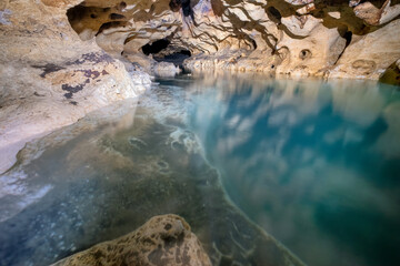 Gator Hole Spring Cave during water drawn down to repair the dam. Merritts Mill Pond, Mariana, Florida
