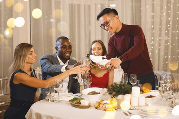 Group of multinational people at the table.