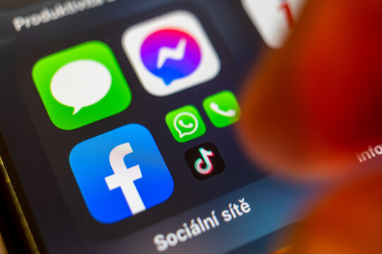 Smart phone with social media logo,  a popular social network on the internet - czech mobility - tik tok, Facebbok, WhatsApp, Messenger