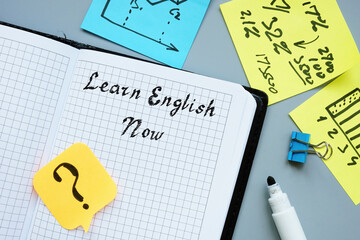 Conceptual photo about Learn English Now with handwritten text.