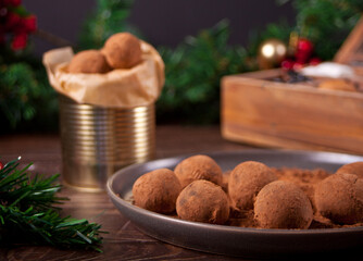 homemade chocolate balls truffles on the plate.