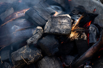 Black coal that have fire and smoke background