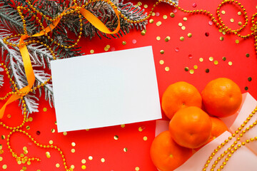 mockup christmas card. fir branches, Christmas toys and tangerines 