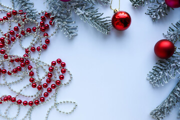 mockup christmas card. frame of fir branches, Christmas balls and garlands