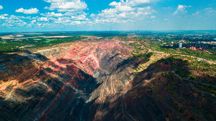 Fototapeta na wymiar Iron ore quarry open pit mining of iron ore is huge.