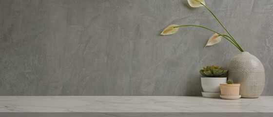 Home interior design with copy space, plant pots and vase on the table