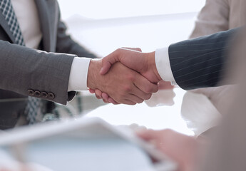 confident handshake of business partners