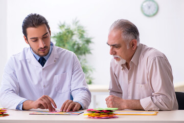 Doctor and patient suffering from Alzheimer disease