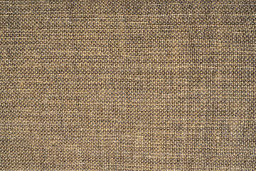 Linen dense fabric pattern of Metal gold color for curtains design or internal wall decoration of a modern building with vibrant shiny material. High quality photo