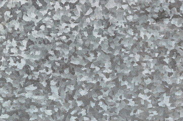 metal grunge background: sheet of rolled metal with scratches and stains, dirt. Toning, close
