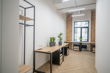 Picture of a modern office with white furniture