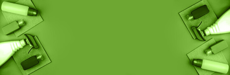 Banner made from cleaning products are on green background.