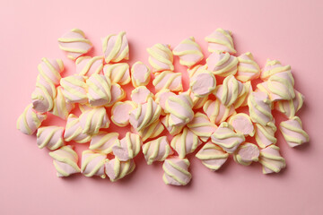 Sweet marshmallow on pink background, top view