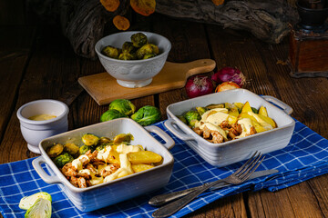 Gratinated Zurich ragout with Brussels sprouts, potatoes and Bearnaise sauce