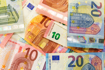 Pile of euro banknotes as background