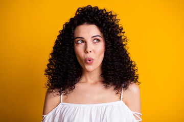 Photo portrait of curious interested woman looking at blank space whistling isolated on vivid...