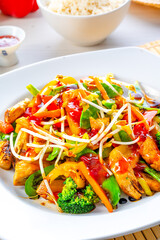sweet and sour chicken with rice and vegetables