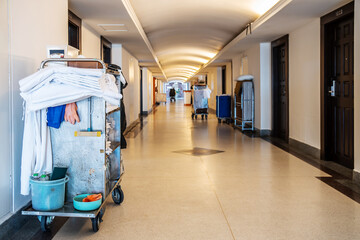 Cleaners trolley with cleaning equipments at hotel, Copy space for text, Concept of room service...