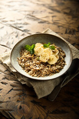 Traditional homemade granola with fresh banana