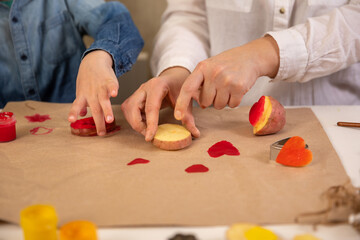 DIY potato print. handmade gift wrapping with an exclusive print pattern.