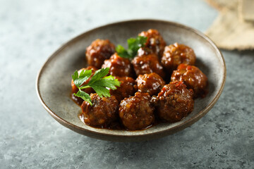 Homemade spicy meatballs with fresh parsley