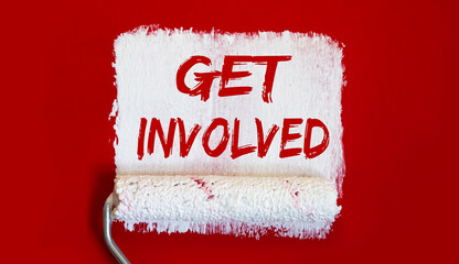 Get Involved .One open can of paint with white brush on red background. Top view.