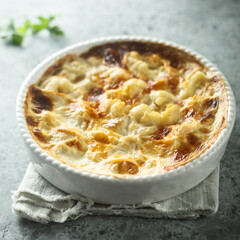 Homemade cauliflower gnocchi casserole with cheese