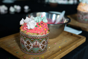 Traditional Easter Bread - Ukrainian Paska, on the wooden board.