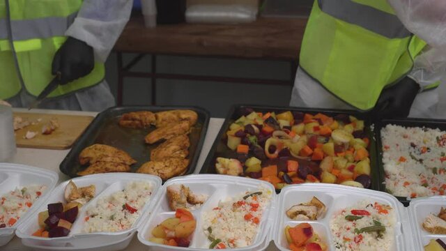 A free Christmas food basket, lunch, or dinner in the Community kitchen. Volunteers pack free hot meals in lunchboxes. A charitable organization. Free groceries as well as meal services