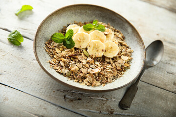 Traditional homemade granola with fresh banana