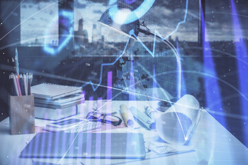 Double exposure of stock market graph drawing and office interior background. Concept of financial analysis.