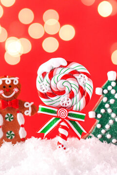 Christmas Lollipop in the snow with bokeh. Happy Christmas and happy New year concept. Christmas background. Copy space.