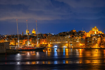Fototapeta na wymiar City Skyline of Senglea at Night in Malta