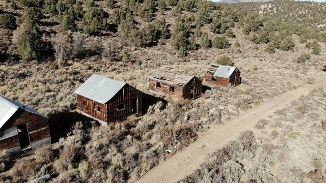 Nevada Cinnabar Mine and Ghost Town.  The Mine Produced Mercury from 1914 to 1918.  Ruins of Several Cabins and a 50 Ton Furnace Remain.  Located in the Shoshone Range near Ione, Nevada.  Aerial Drone
