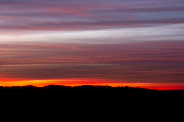 Fototapeta na wymiar colorful sunset over the mountains